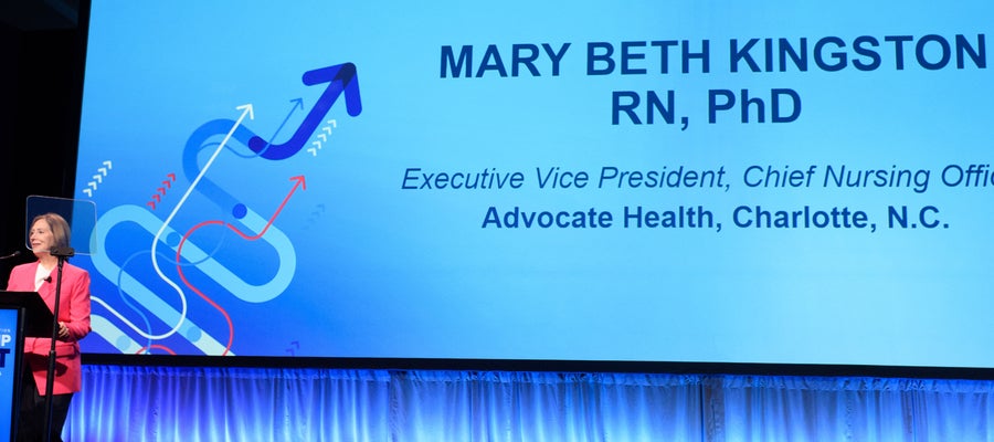 Mary Beth Kingston name on screen at Leadership Summit