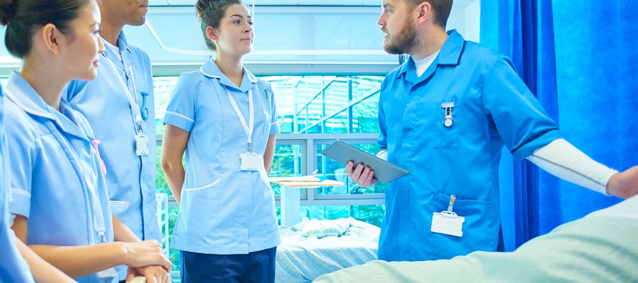 Bedside instructor with 3 students