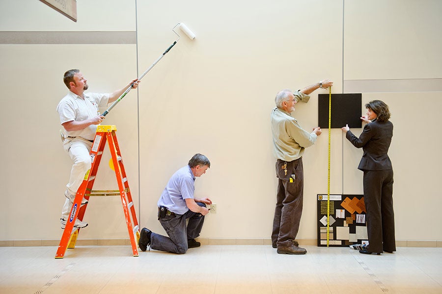 Workers performing maintenance and renovation in a hospital